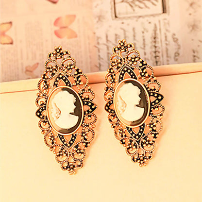 Hollow Sculptural Figure Earrings