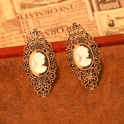 Hollow Sculptural Figure Earrings